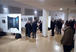 view of exhibition with painting 'A Time Of Remorse'