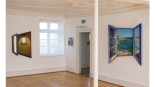 view of additional paintings in the exhibition