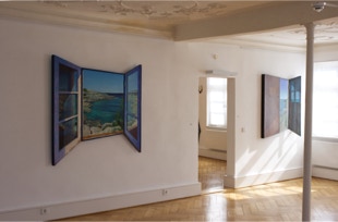 view of additional paintings in the exhibition