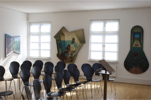 view of additional paintings in the exhibition