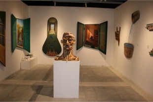 Paul Critchley shaped paintings exhibited in Rotterdam Contemporary Art Fair 2017, with shaped paintings by Csilla Bondor and wooden sculpture by Marcel Warmenhoeven
