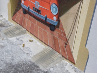 detail of the mural - 'taxi' in a garage'
